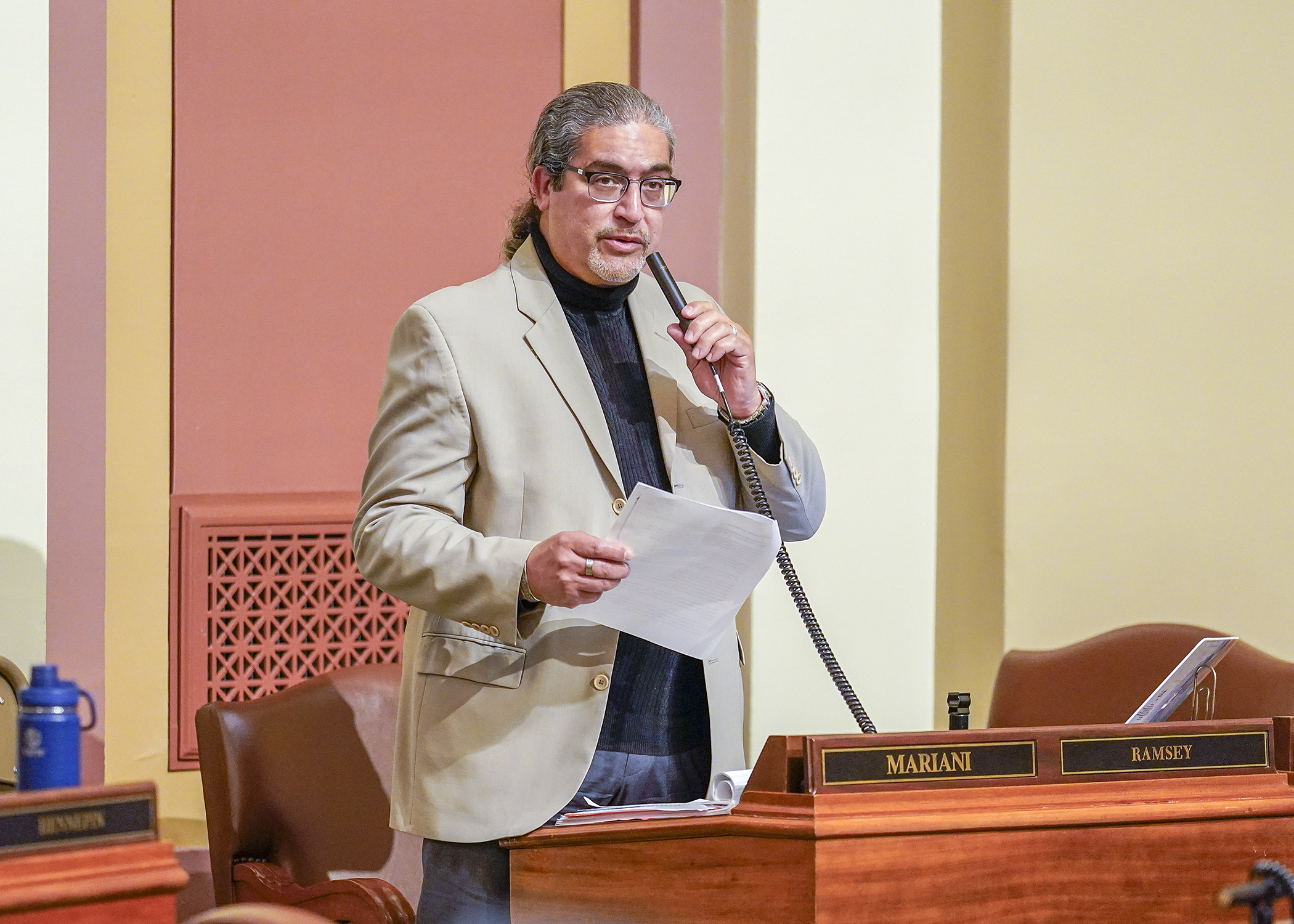 Rep. Carlos Mariani, chair of the House Public Safety and Criminal Justice Reform Finance and Policy Committee, makes opening comments on the omnibus judiciary and public safety supplemental finance and policy bill April 29. (Photo by Andrew VonBank)